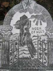 close up of design on Burkett family monument. Found on same side as Elizabeth Burkett inscription